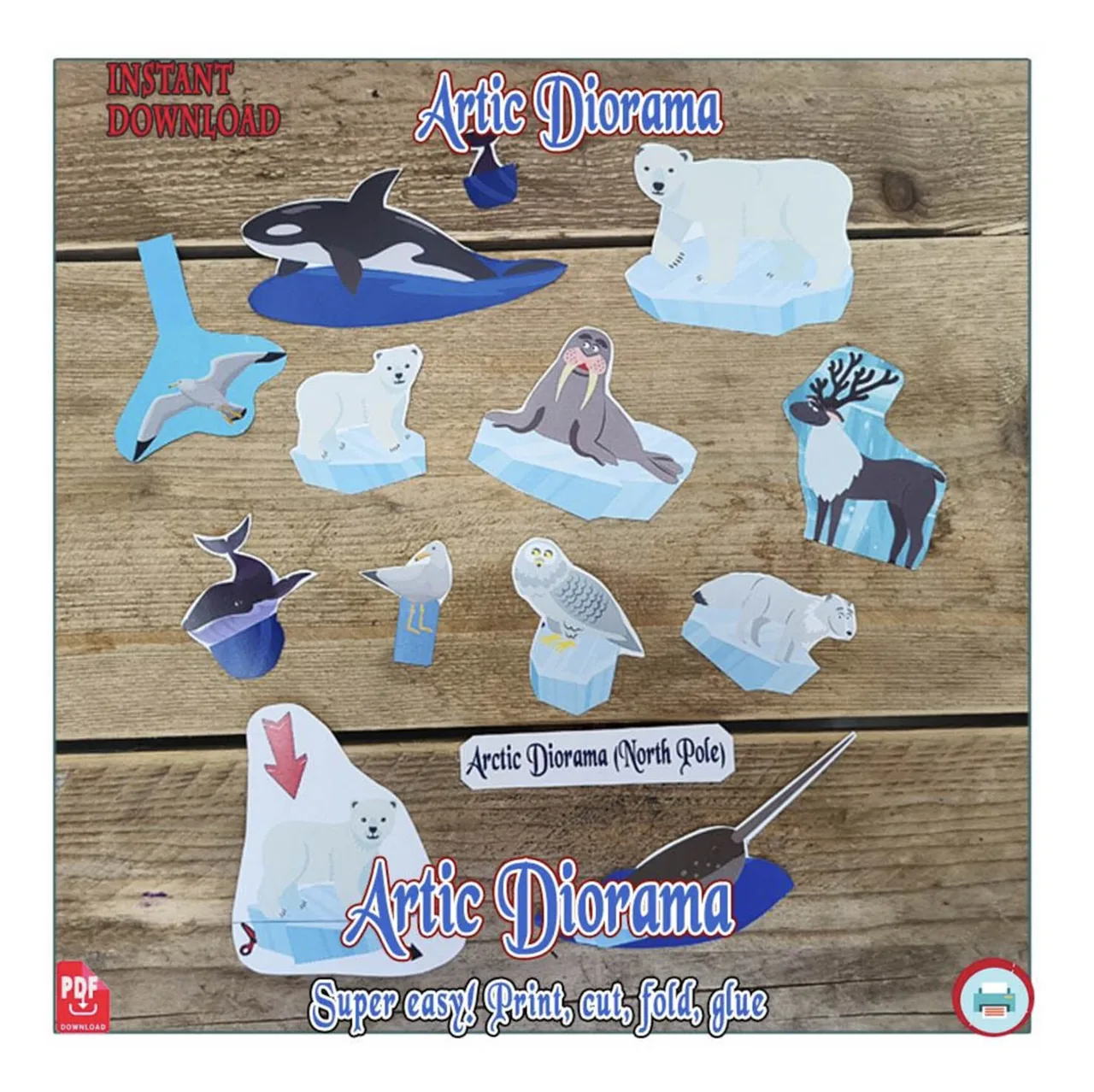 Separate paper animal cutouts including polar bears, a walrus, an orca, a narwhal, a reindeer and a snowy owl