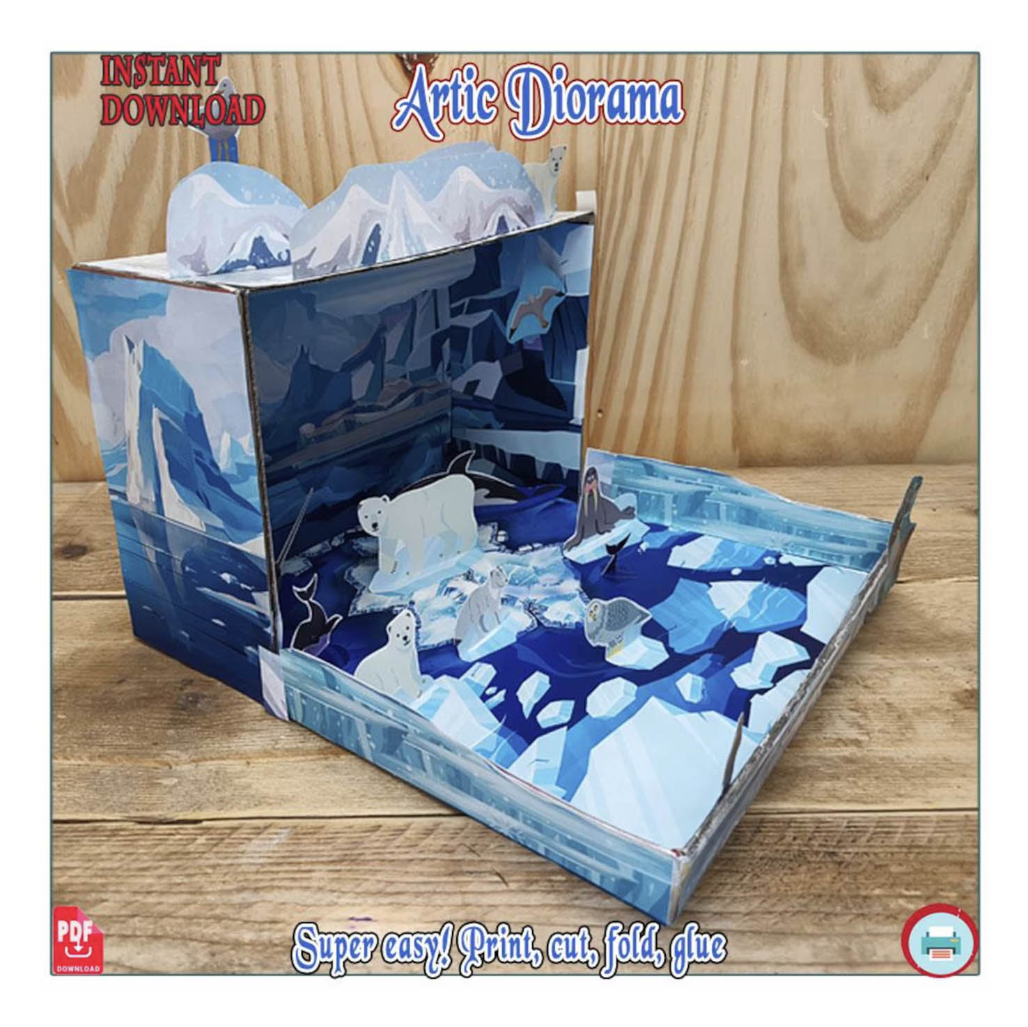 Left-side view of an Arctic shoebox diorama showing the upright box walls, extended base and standing paper animals