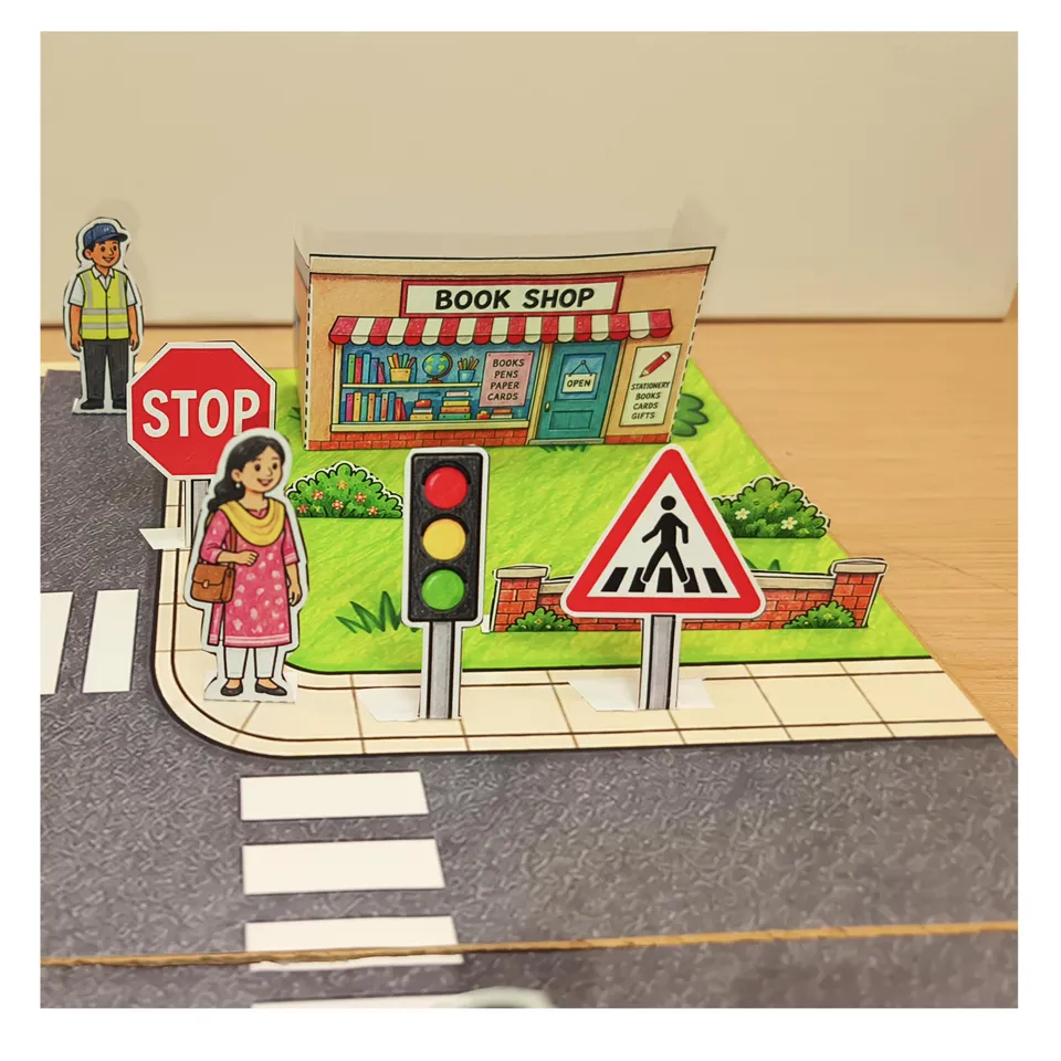 Bookshop scene with paper traffic signal, stop sign and crossing sign