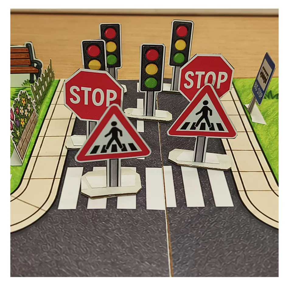 Standing traffic light models, stop signs and pedestrian crossing signs